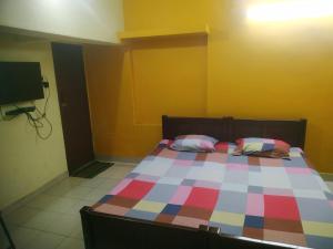 En eller flere senge i et værelse på Tourist home