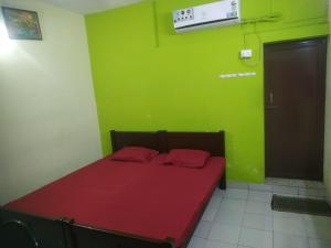 En eller flere senge i et værelse på Tourist home