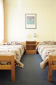 Postel nebo postele na pokoji v ubytování Amicus Hotel + 37 fotografií