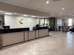 an office lobby with a crescent moon on the wall at Comfort Inn Conover-Hickory in Conover