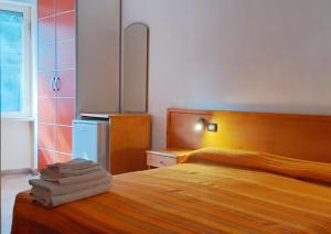 A bed or beds in a room at Residence Stella Maris