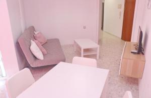 Televízia a/alebo spoločenská miestnosť v ubytovaní Apartamento en el centro