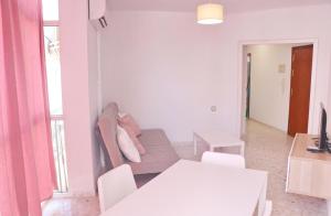 Posedenie v ubytovaní Apartamento en el centro