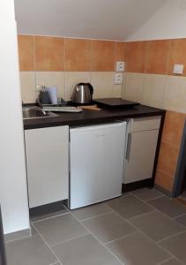 Kuchyňa alebo kuchynka v ubytovaní Hotel Garni Belveder