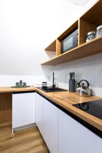 Kuchyňa alebo kuchynka v ubytovaní Apartament Koko Białka Tatrzańska