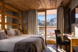 Postel nebo postele na pokoji v ubytování Hotel Cote Brune