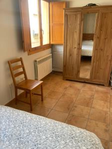 Łóżko lub łóżka w pokoju w obiekcie Barranco de la Olla by Apartamentos Arnedillo