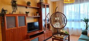 Μια τηλεόραση ή/και κέντρο ψυχαγωγίας στο Apartamento Inma