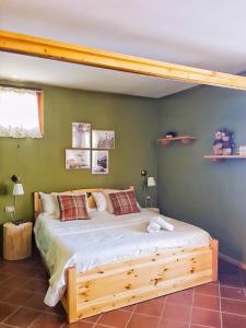 Ένα ή περισσότερα κρεβάτια σε δωμάτιο στο Bormio Little house +15 φωτογραφίες