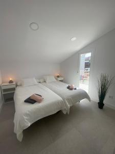Cama o camas de una habitación en Design Club Santander