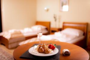 Postel nebo postele na pokoji v ubytování Septimia Hotels & Spa Resort