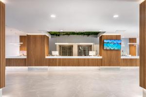 TV a/nebo společenská místnost v ubytování Hotel Vibra Beverly Playa