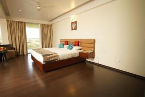 Malabar Residency客房内的一张或多张床位