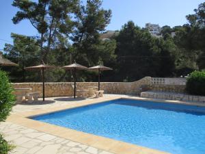 The swimming pool at or close to Strandnahe Wohnung mit Meerblick