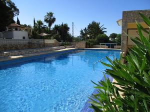 The swimming pool at or close to Strandnahe Wohnung mit Meerblick