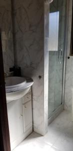 A bathroom at Strandnahe Wohnung mit Meerblick
