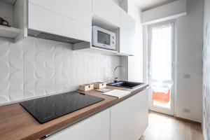 A kitchen or kitchenette at A Casa di Ale