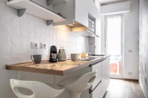 A kitchen or kitchenette at A Casa di Ale Még 7 kép
