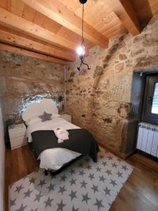 Ένα ή περισσότερα κρεβάτια σε δωμάτιο στο Casa Maral