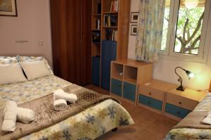 Una cama o camas en una habitación de Villa Aliki