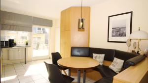 Η κουζίνα ή μικρή κουζίνα στο nur 100 m bis zum Strand Appartmentanlage Eldena FeWo 15 +16 φωτογραφίες