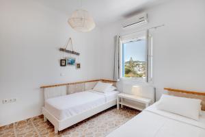 Voodi või voodid majutusasutuse Endless Blue from Syros - Fabrika Resort - House 1 toas