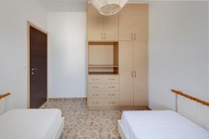 Voodi või voodid majutusasutuse Endless Blue from Syros - Fabrika Resort - House 1 toas