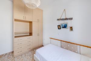 Voodi või voodid majutusasutuse Endless Blue from Syros - Fabrika Resort - House 1 toas