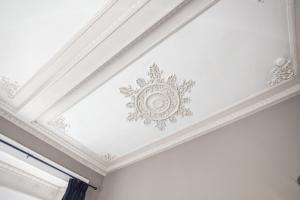 a coffered ceiling with a painting on it at Beautiful 2 to 3 bed apartment with stunning views! in Ayr