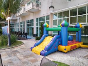 a playground in front of a building at PORTO MARINA MONT BLANC RESORT in Mangaratiba