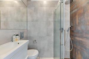 Kúpeľňa v ubytovaní Szeroka Boutique by Downtown Apartments