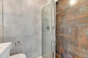 Kúpeľňa v ubytovaní Szeroka Boutique by Downtown Apartments