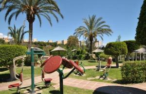 Zahrada ubytování Precioso apartamento con piscinas y vistas al mar.