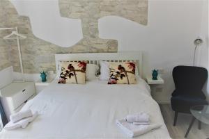 Voodi või voodid majutusasutuse B&B Belvedere All'Idria toas