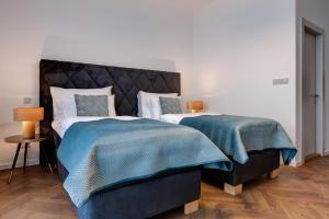 Кровать или кровати в номере Hotel Central Park