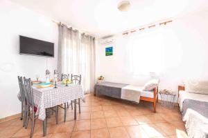 TV a/nebo společenská místnost v ubytování Apartment Hannah