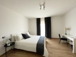 Cama ou camas em um quarto em Casa Giulia