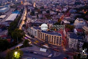 an overhead view of a city at night at Panorama Hotel - Free EV Charging Station in Varna City