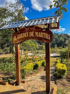 a sign for a garden of marmite in a park at Cotan Ecolodge in La Esperanza