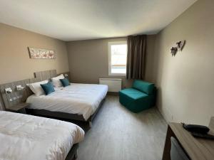 Postel nebo postele na pokoji v ubytování Hotel Ecluse 34