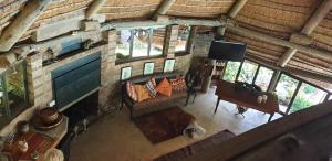 an overhead view of a living room with a fireplace at The Lapa in Durban
