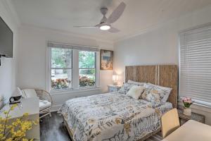 a bedroom with a bed and two windows at Florida Home Travel NursesandExtended Stays Welcome in St Petersburg