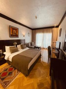 Postel nebo postele na pokoji v ubytování Hôtel Club Val d'Anfa Casablanca Ocean view