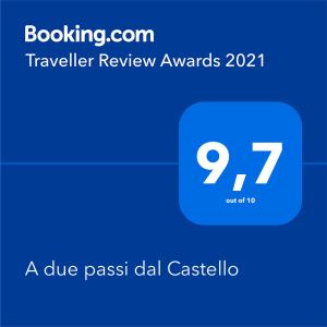 Et logo, certifikat, skilt eller en pris der bliver vist frem på A due passi dal Castello