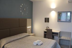Кровать или кровати в номере Villa Elisa