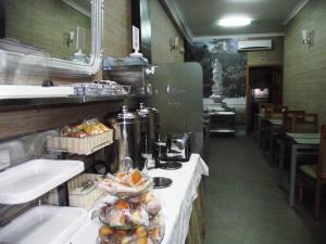 Restorāns vai citas vietas, kur ieturēt maltīti, naktsmītnē Hotel O Gadanha