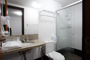 Um banheiro em Savassi Hotel