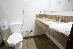Um banheiro em Savassi Hotel