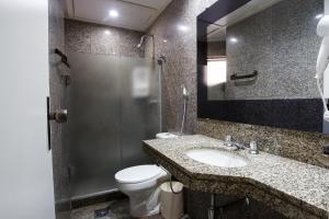 Um banheiro em Savassi Hotel