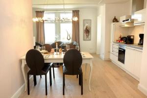 Kuchyň nebo kuchyňský kout v ubytování Villa Rheingold Villa Rheingold 6